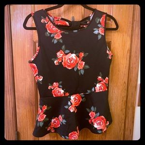 Rose flowered peplum sleeveless top